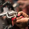 Police instructed to surrender guns; The businessman said that the licensed revolver was stolen